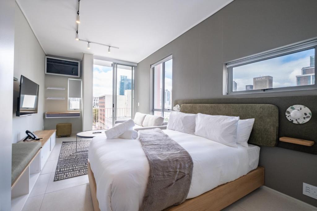 The Rose 406: Central City Studio Apartment