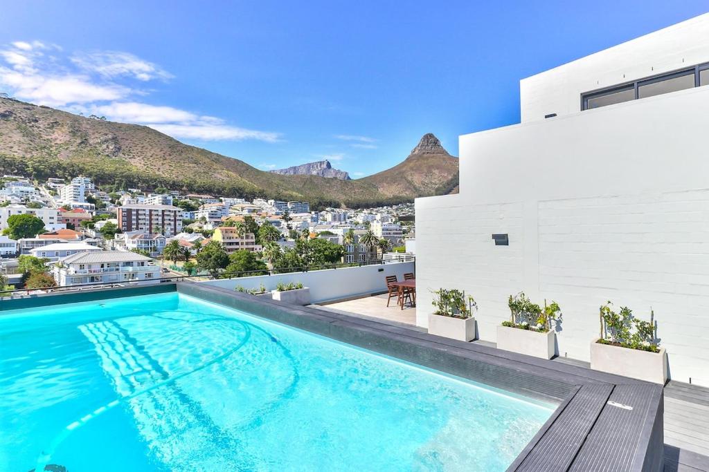 Stylish, brand new, secure apartment with pool